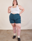 Marielena is 5'8" and wearing 2XL Western Shorts in Lagoon paired with Cropped Tank in vintage tee off-white