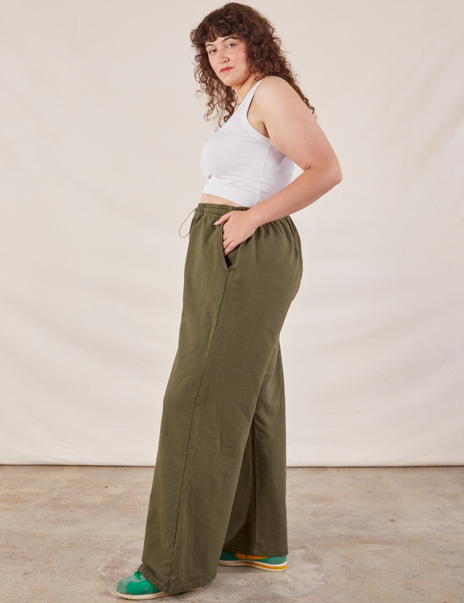 Wide Leg Sweat Pants in Surplus Green side view on Ryan