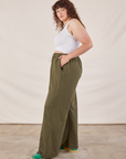 Wide Leg Sweat Pants in Surplus Green side view on Ryan