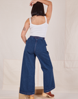 Back view of Indigo Wide Leg Trousers in Dark Wash and vintage off-white Cami on Betty