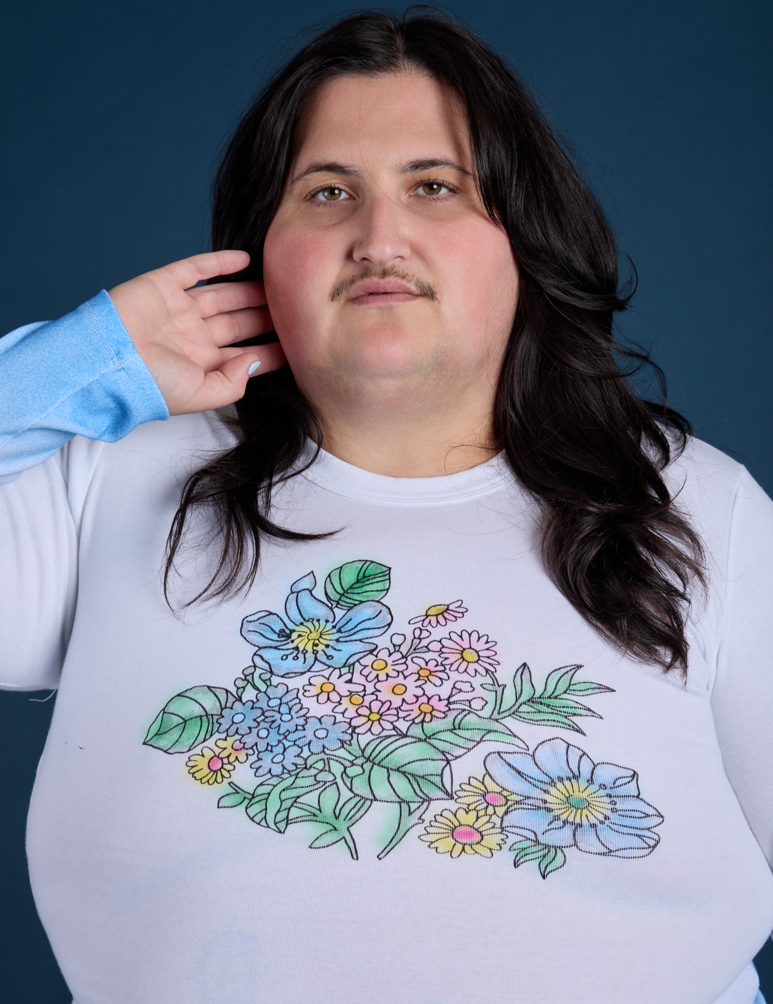 Floral Long Sleeve Baby Tee in Baby Blue front close up on Sam