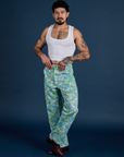 Jesse is 5’7” and wearing S Winter Floral Print Work Pants paired with a Cropped Tank in Vintage Tee White