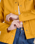 Front close up of Denim Work Jacket in Mustard Yellow on Alex