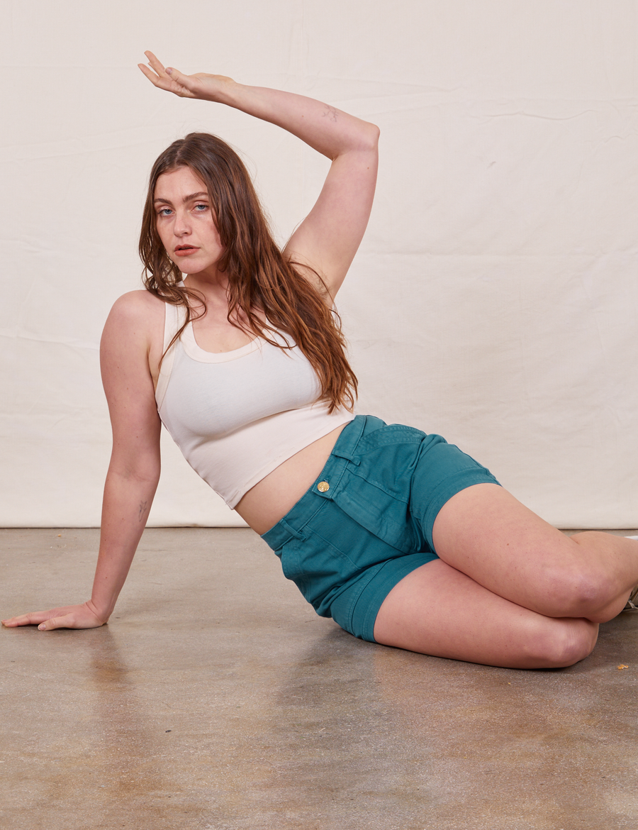 Allison is wearing Classic Work Shorts in Marine Blue and vintage off-white Tank Top