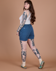 Angled back view of Classic Work Shorts in French Blue on Sydney