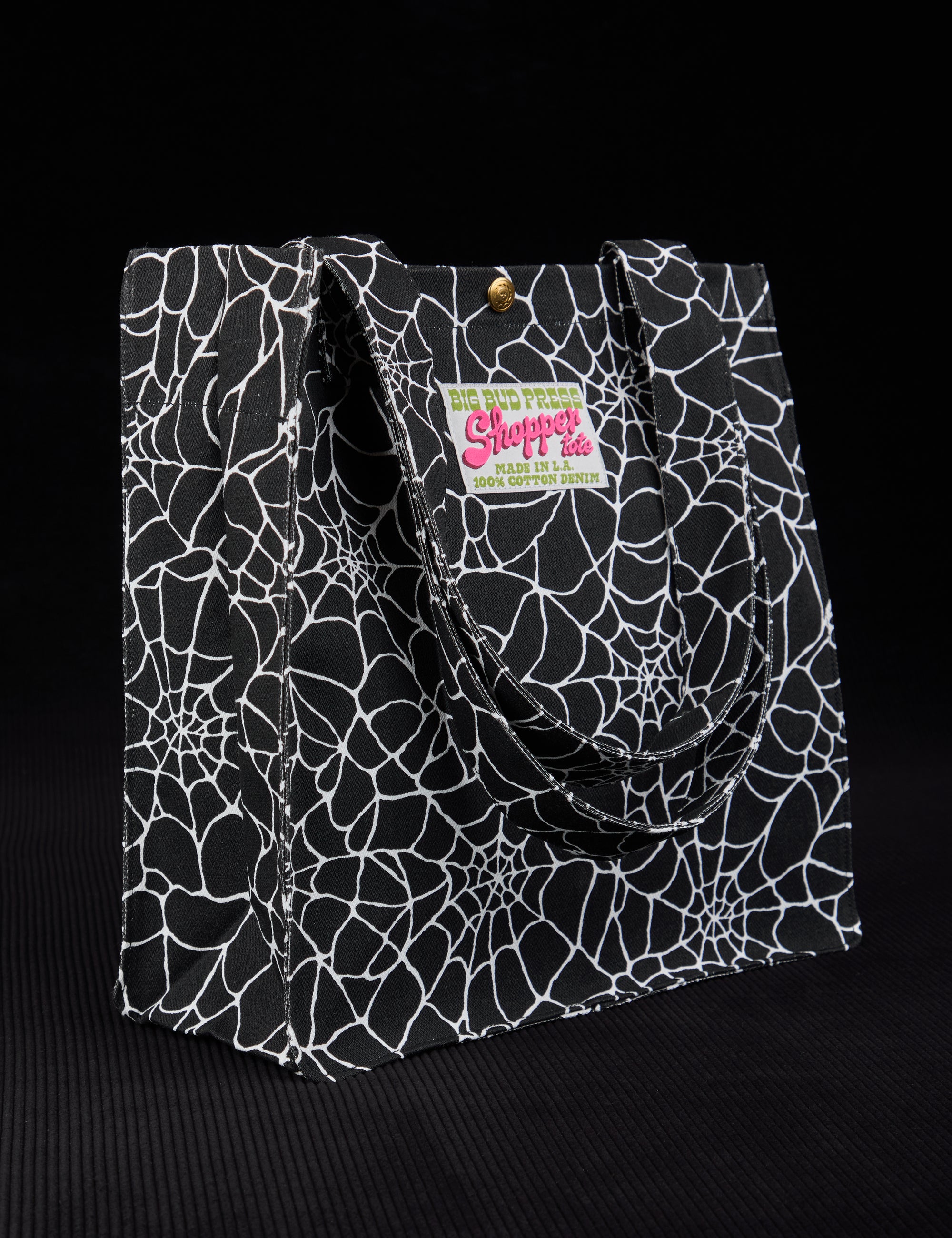 Angled view of Spider Webs Printed Shopper Tote