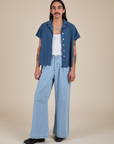 Pantry Button-Up in French Blue and light wash Indigo Wide Leg Trousers on Anthony