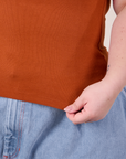 Baby Tee in Burnt Terracotta bottom hem close up on Ashley