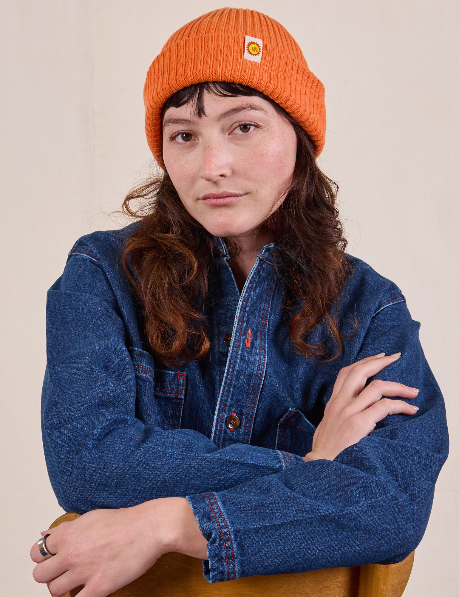 Ribbed Beanie in Construction Orange worn by Alex