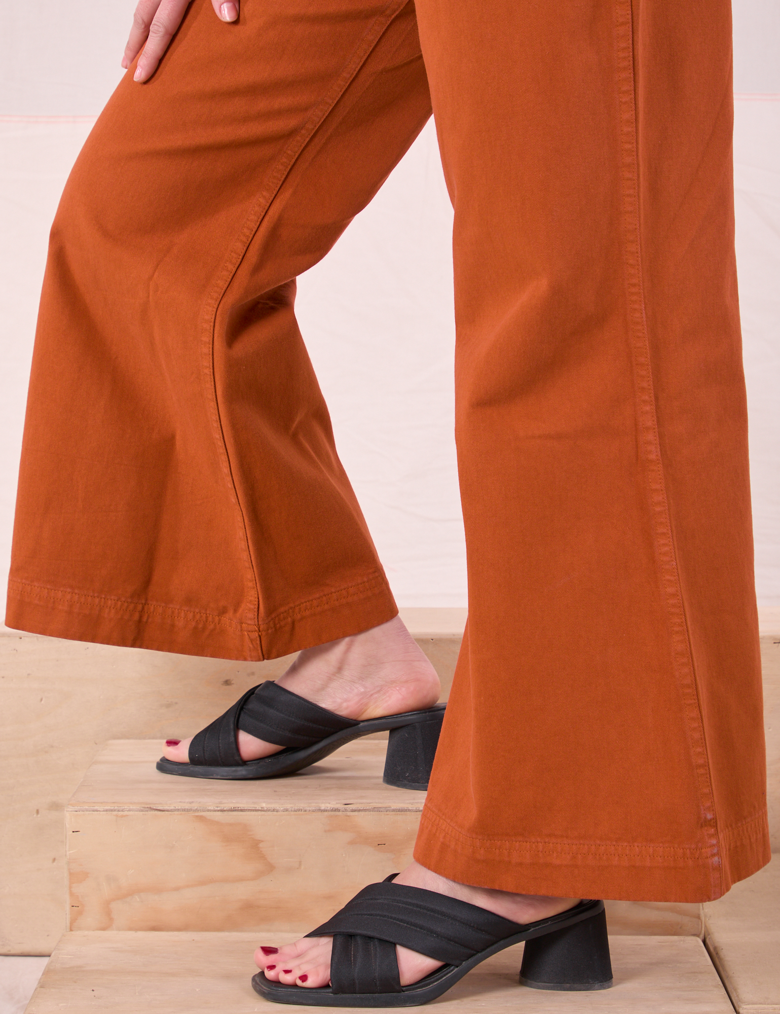 Bell Bottoms in Burnt Terracotta pant leg close up on Betty