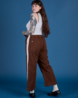 Painted Action Pants in Fudgesicle Brown angled back view on Sydney
