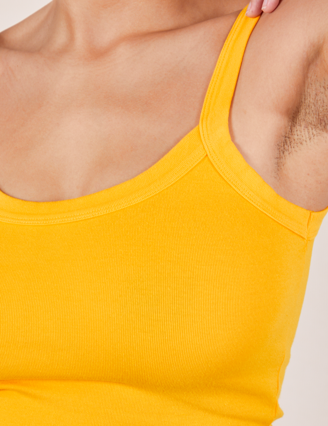 Front close up of Cropped Cami in Sunshine Yellow worn by Tiara
