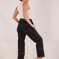 Back view of Carpenter Jeans in Black worn by Tiara
