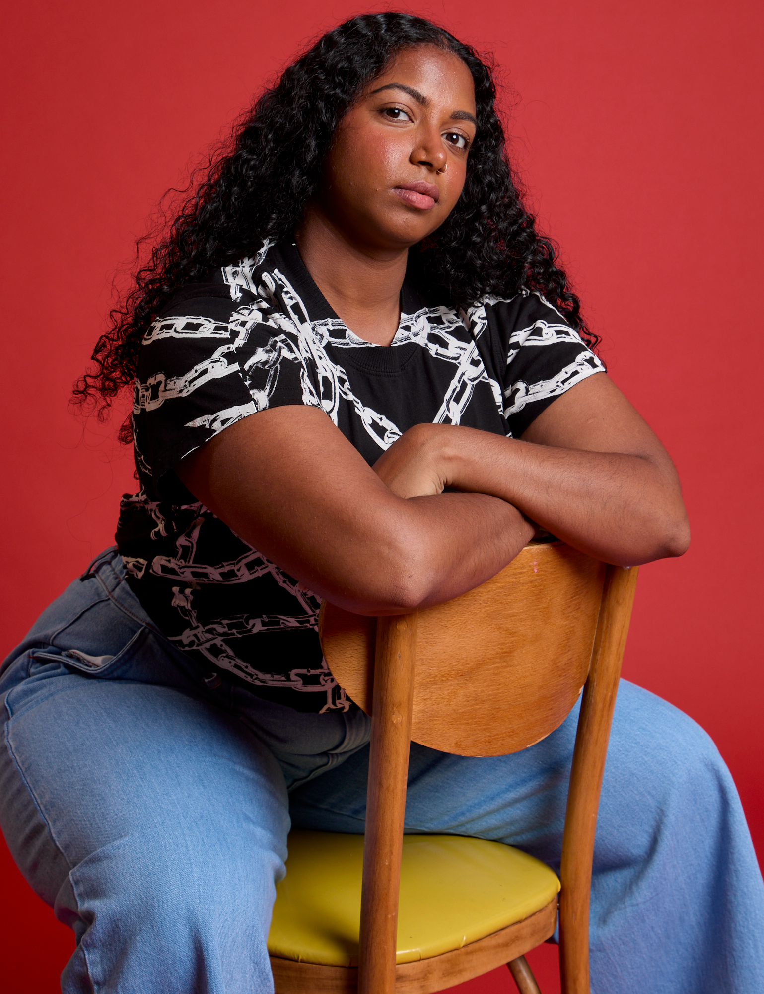 Meghna is wearing Chain Link Vintage Tee in Basic Black