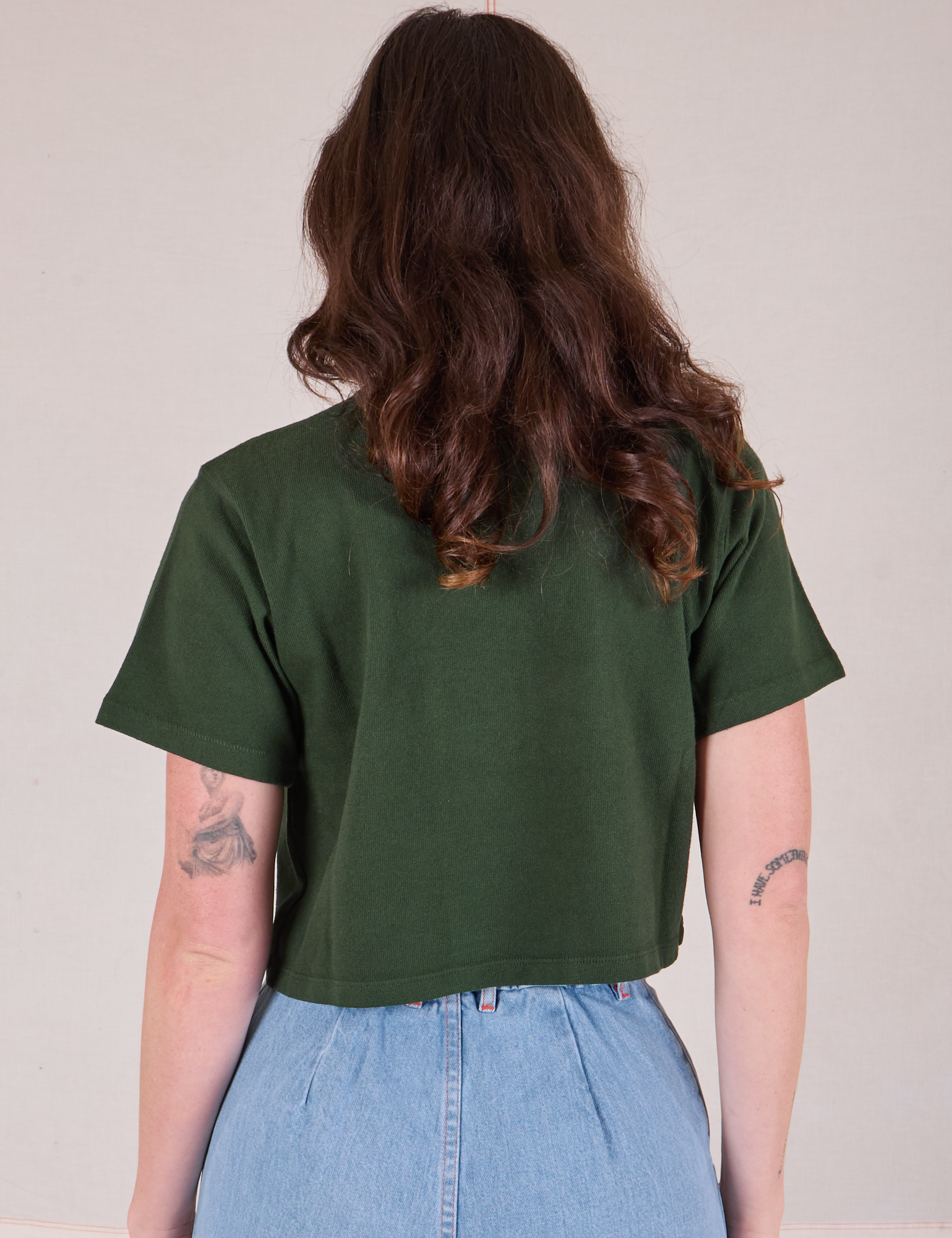 Cropped Burly Tee in Swamp Green back view on Alex