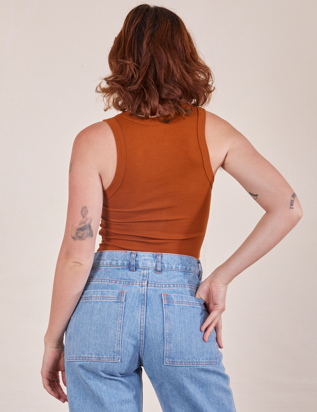Back view of Cropped Tank Top in Burnt Terracotta on Alex