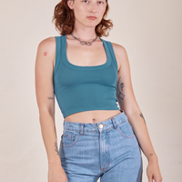Alex is 5'8" and wearing P Cropped Tank Top in Marine Blue