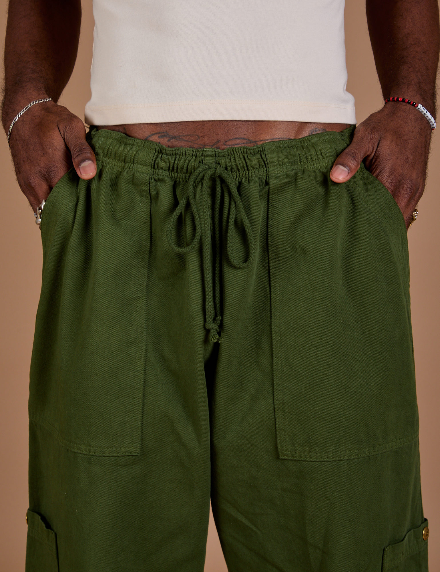 Drop Pocket Cargo Pants in Evergreen front close up on Jerrod