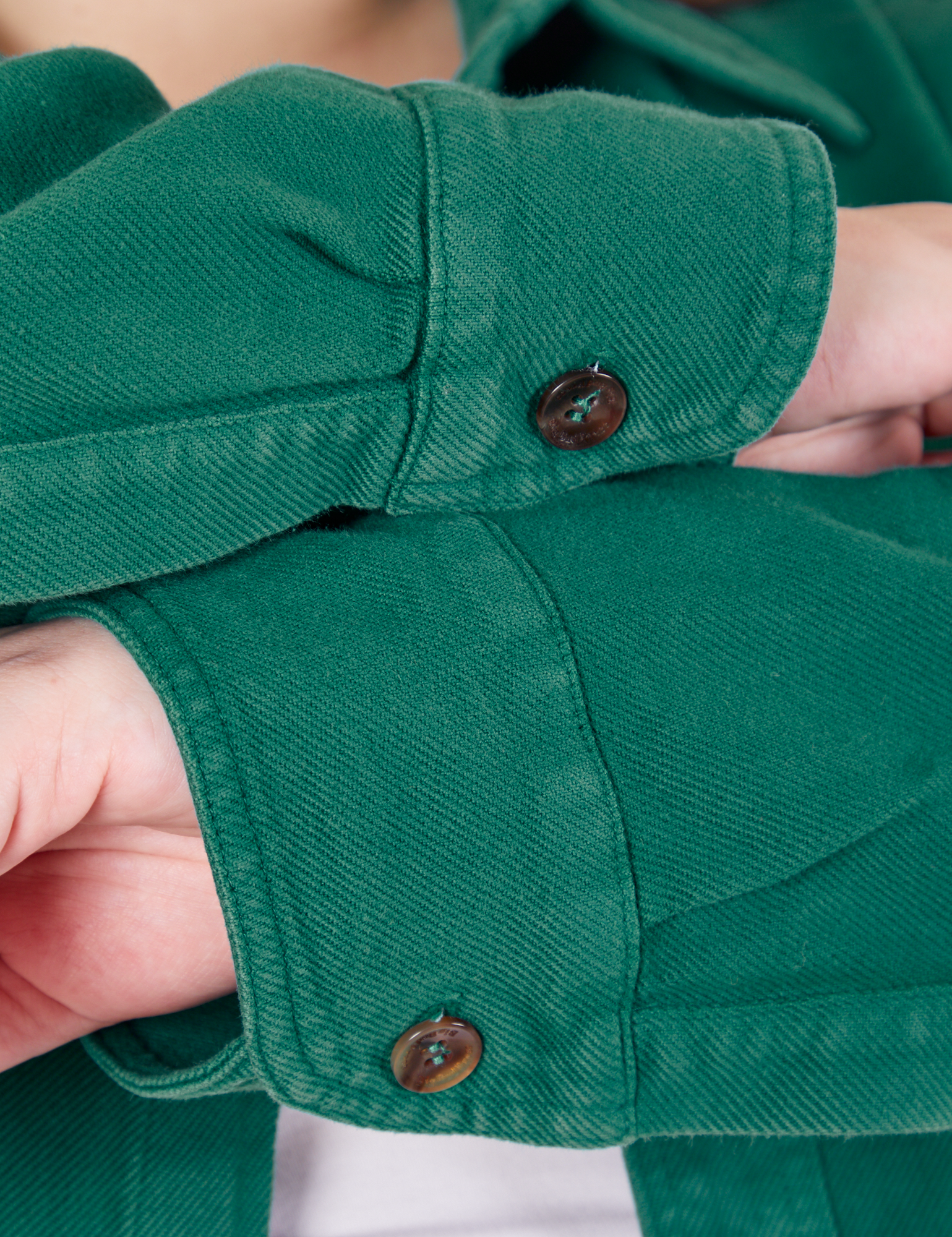 Sleeve cuffs close up of Flannel Overshirt in Hunter Green on Marielena