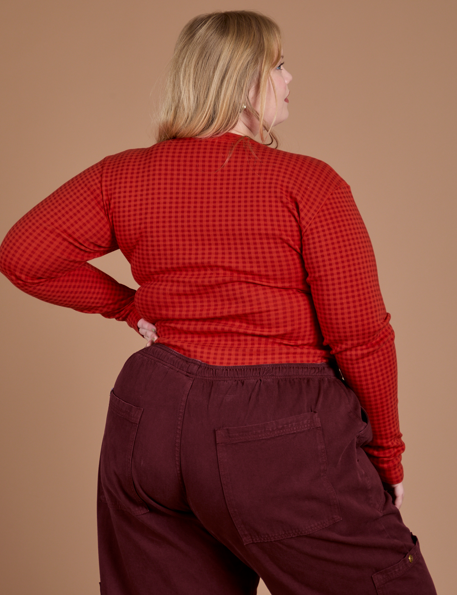 Gingham Long Sleeve Baby Tee in Mustang Red back view on Juliet