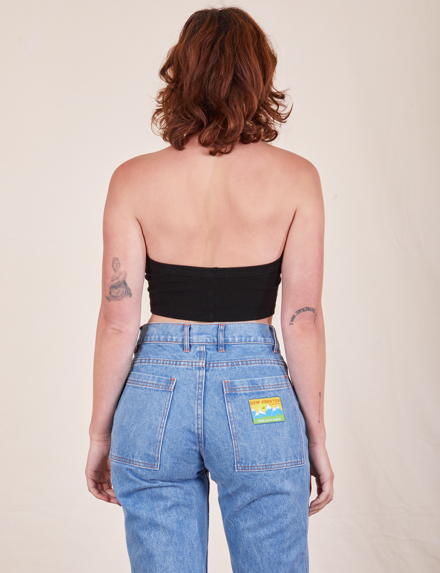 Back view of Halter Top in Basic Black and light wash Frontier Jeans worn by Alex