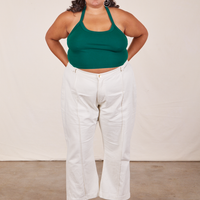 Alicia is wearing Halter Top in Hunter Green and vintage off-white Western Pants