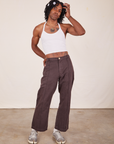Jerrod is wearing Halter Top in Vintage Off-White and espresso brown Western Pants