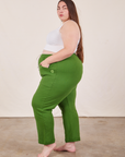 Side view of Cropped Rolled Cuff Sweatpants in Lawn Green on Marielena