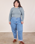 Ashley is wearing Honeycomb Thermal in Periwinkle tucked into light wash Frontier Jeans