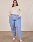 Marielena is wearing Honeycomb Thermal in Vintage Off-White and light wash Denim Trousers