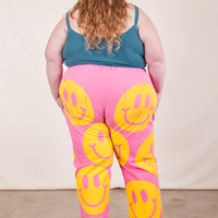 Back view of Icon Work Pants in Smilies and marine blue Cropped Cami worn by Catie