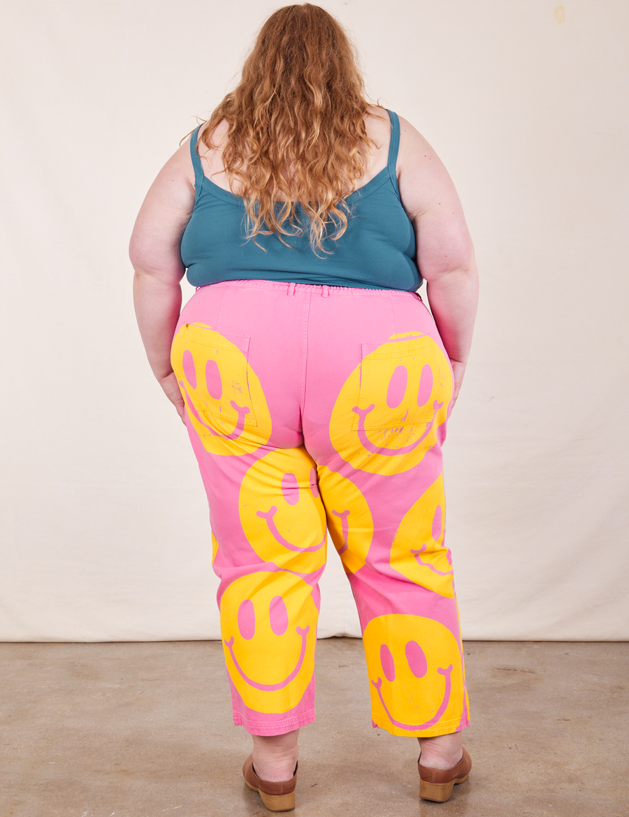Back view of Icon Work Pants in Smilies and marine blue Cropped Cami worn by Catie