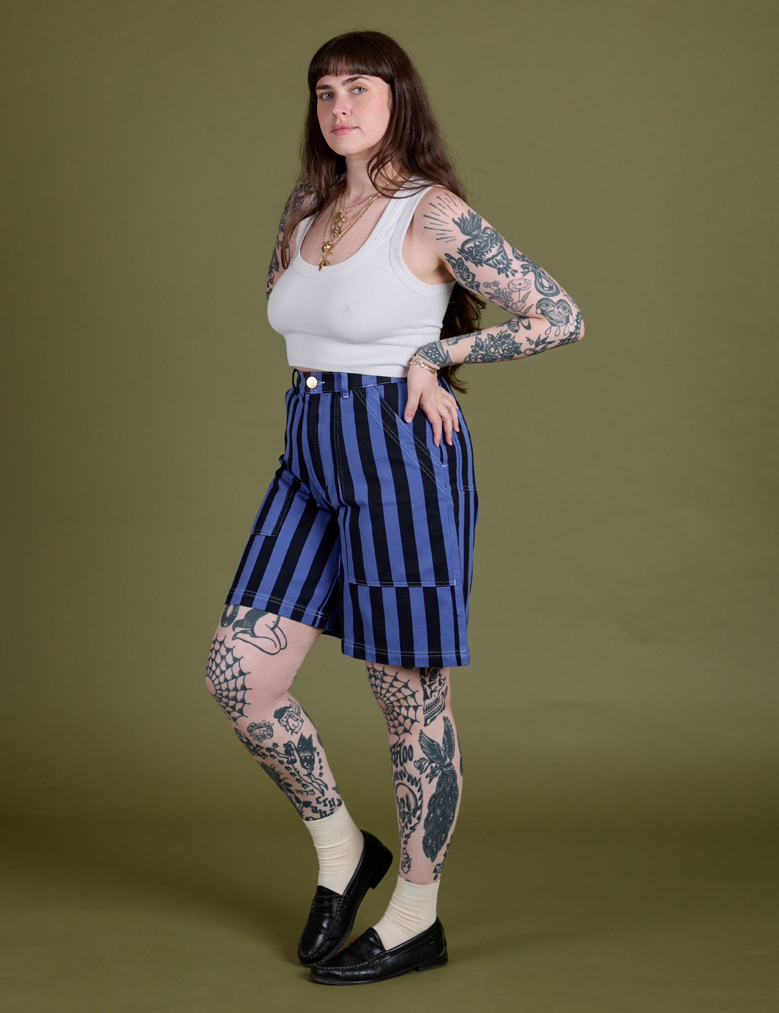 Angled front view of Longline Work Shorts in Cornflower and vintage tee white Cropped Tank on Sydney