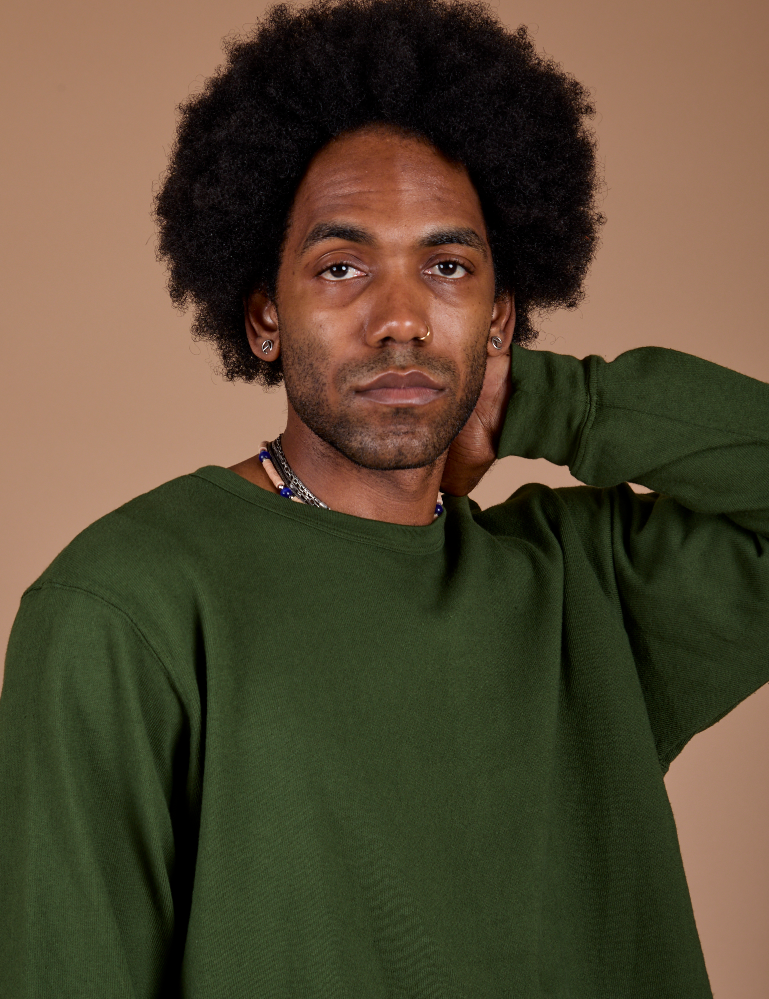 Front close up of Long Sleeve Burly Tee in Evergreen on Jerrod