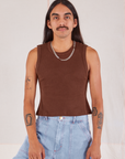 Anthony is 5’10” and wearing S Muscle Tee in Fudgesicle Brown