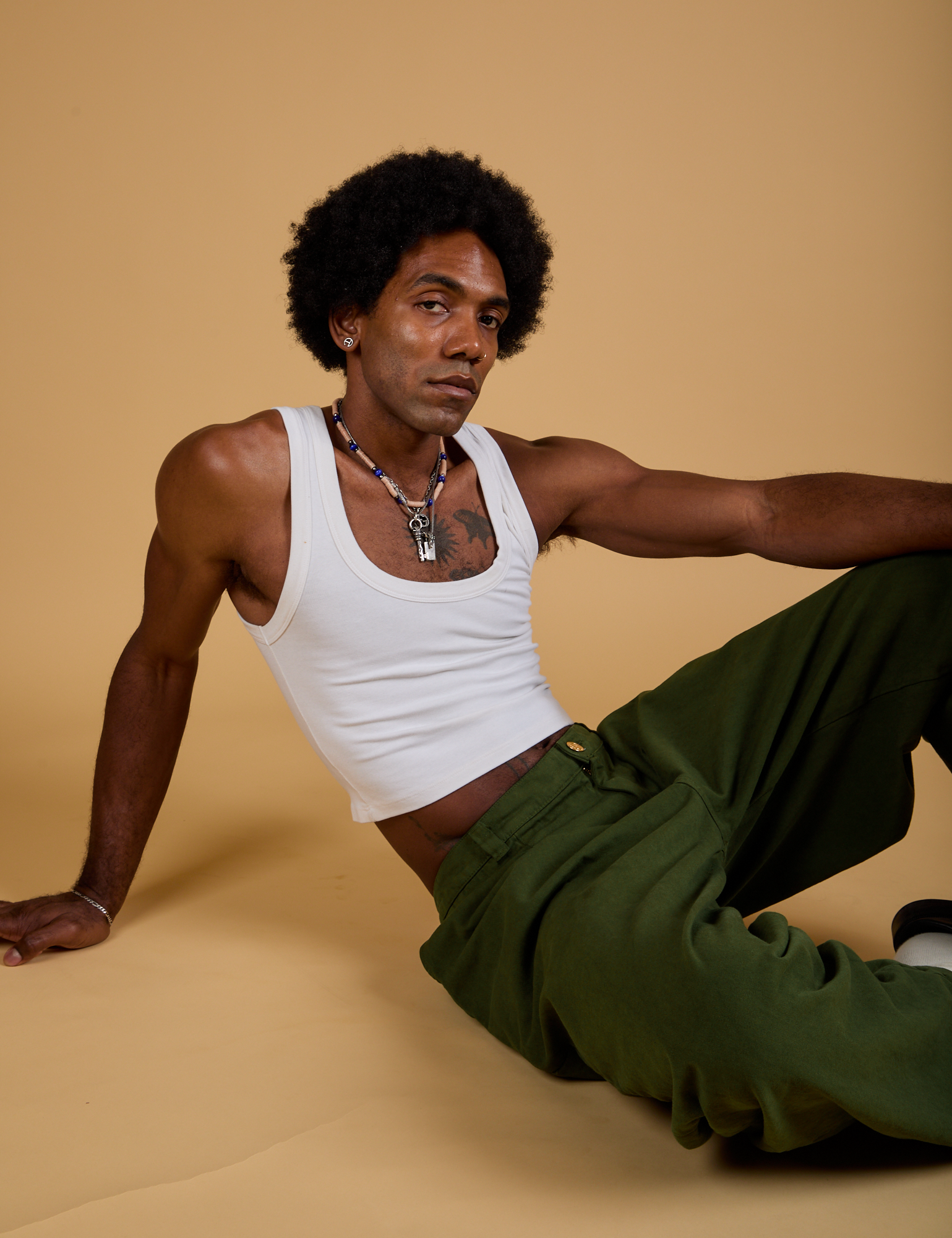 Baggy Mid-Rise Trousers in Evergreen worn by Jerrod