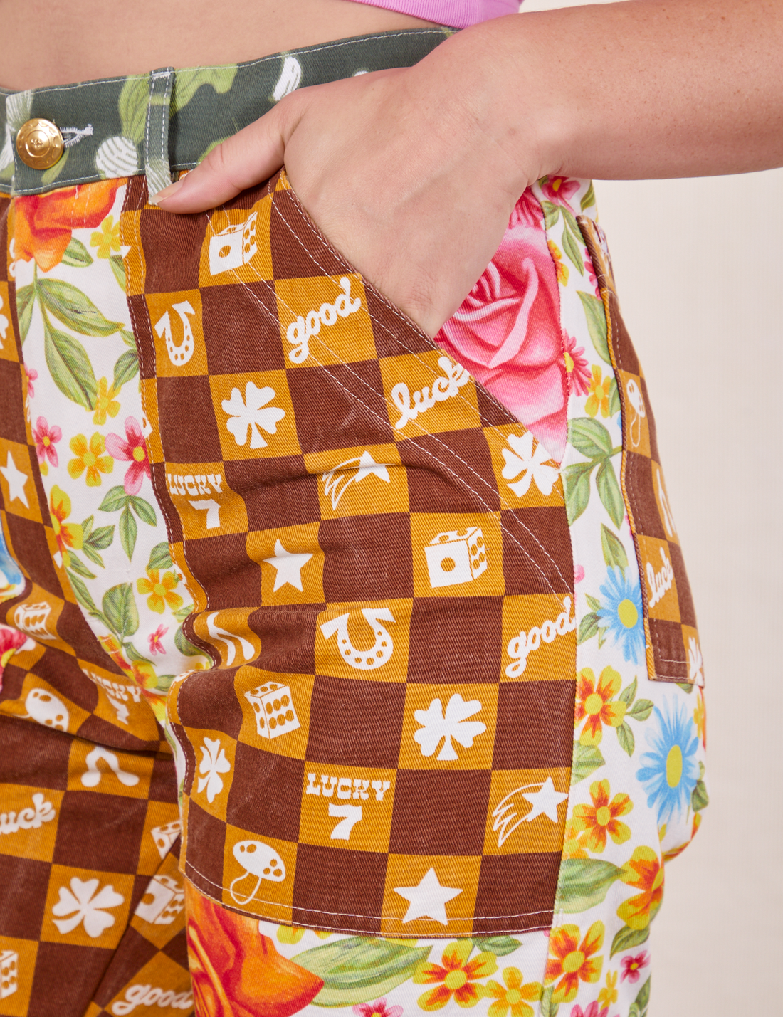 Mismatched Print Work Pants front pocket in our Lucky print close up. Alex has her hand in the pocket.