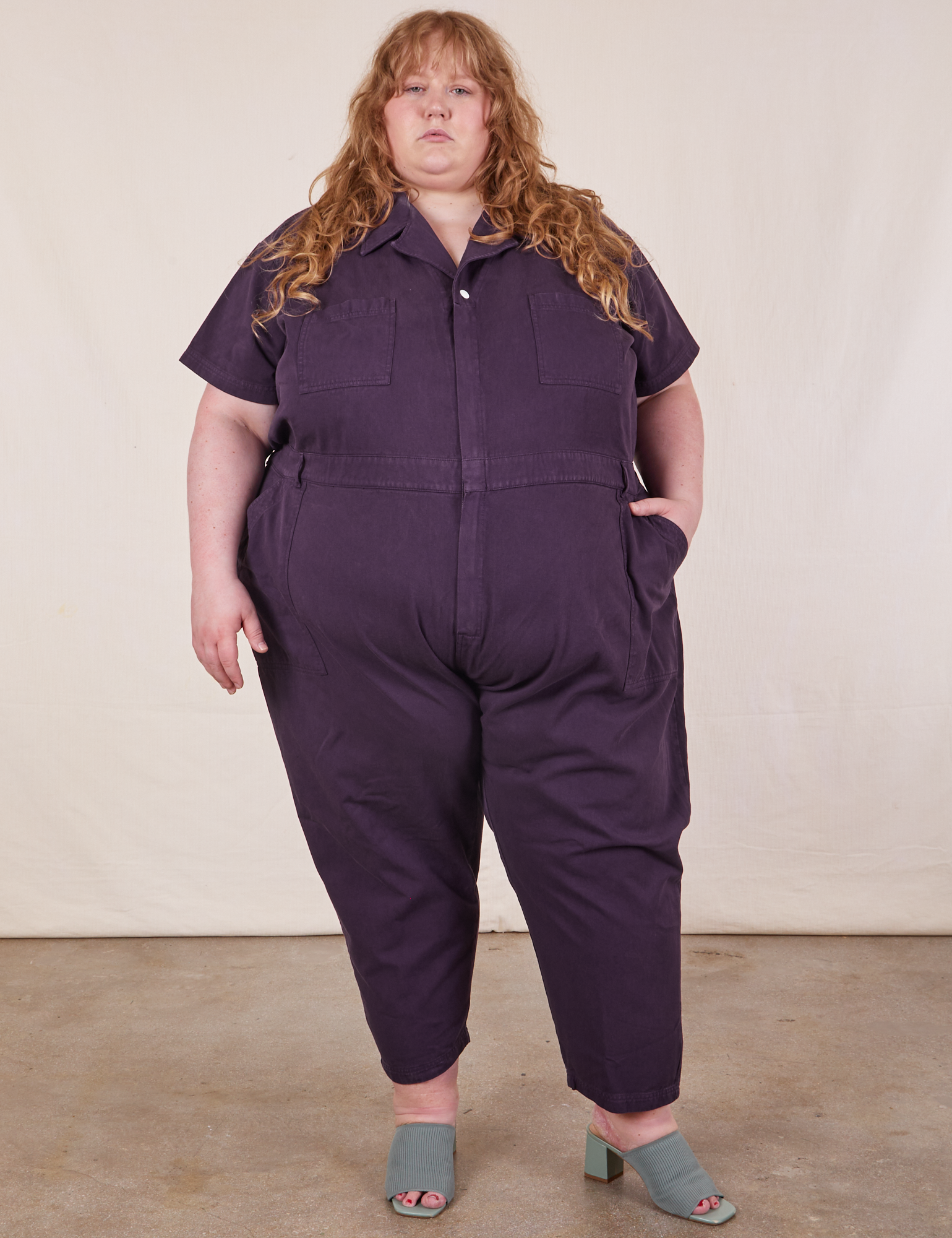 Catie is 5&#39;11&quot; and wearing 5XL Short Sleeve Jumpsuit in Nebula Purple