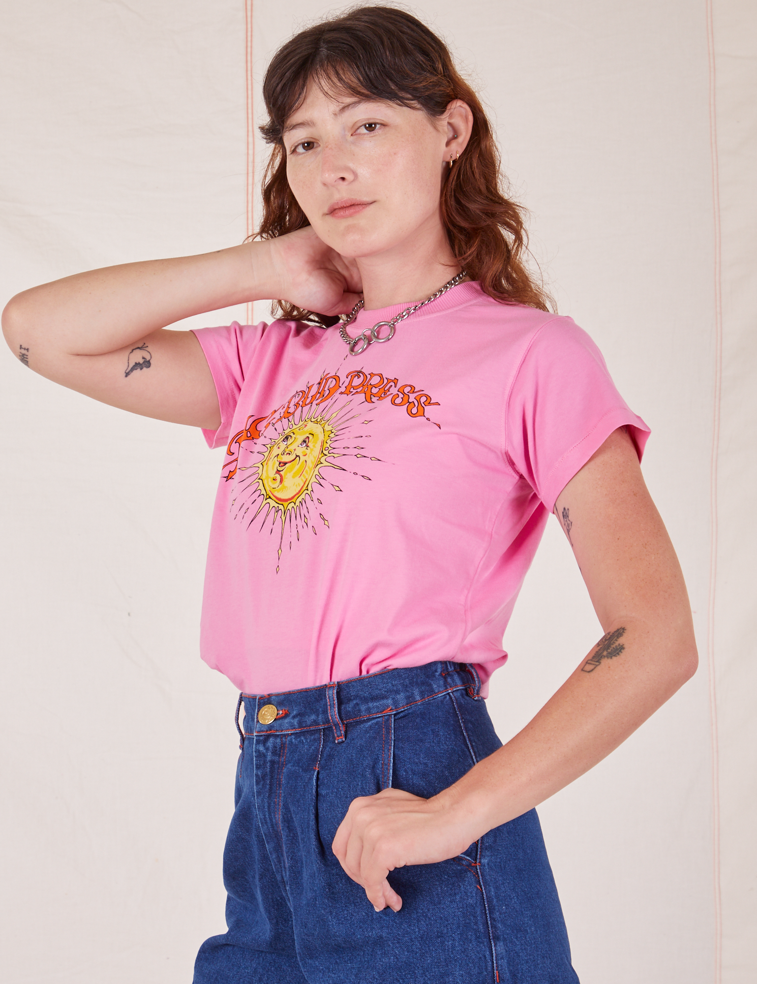 Sun Baby Organic Tee in Bubblegum Pink angled front view on Alex