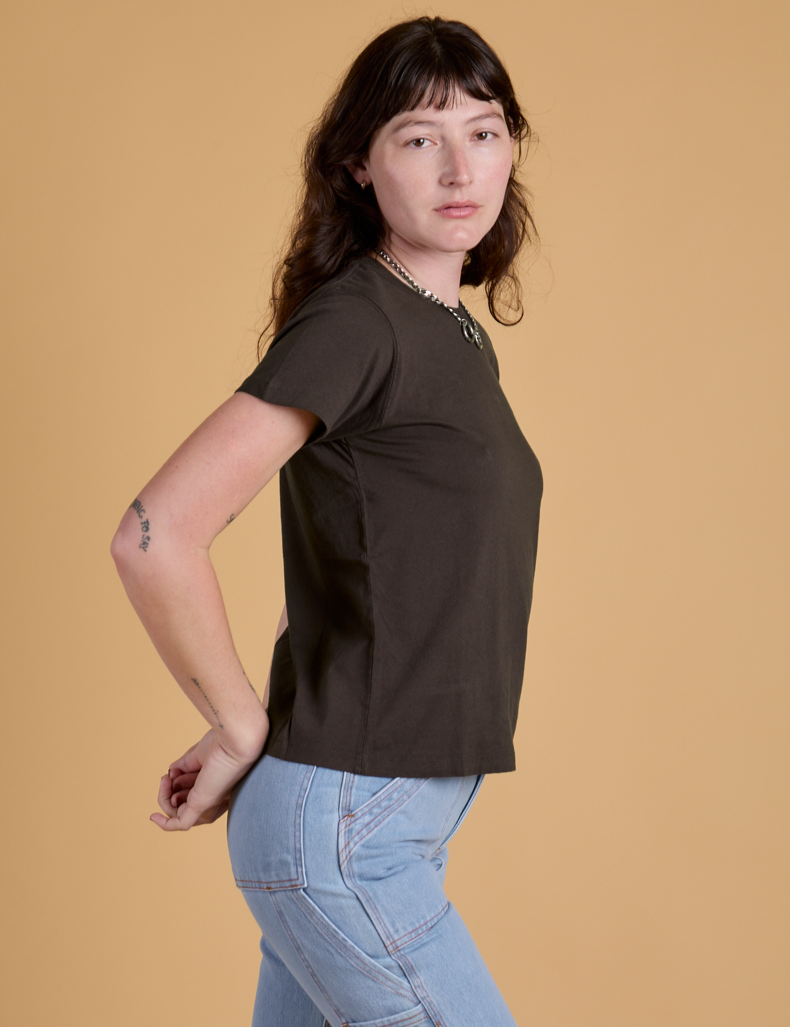 Organic Vintage Tee in Espresso Brown side view on Alex