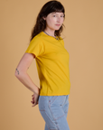 Side view of  Organic Vintage Tee in Sunshine Yellow on Alex
