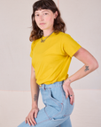 Side view of Organic Vintage Tee in Golden Yellow on Alex