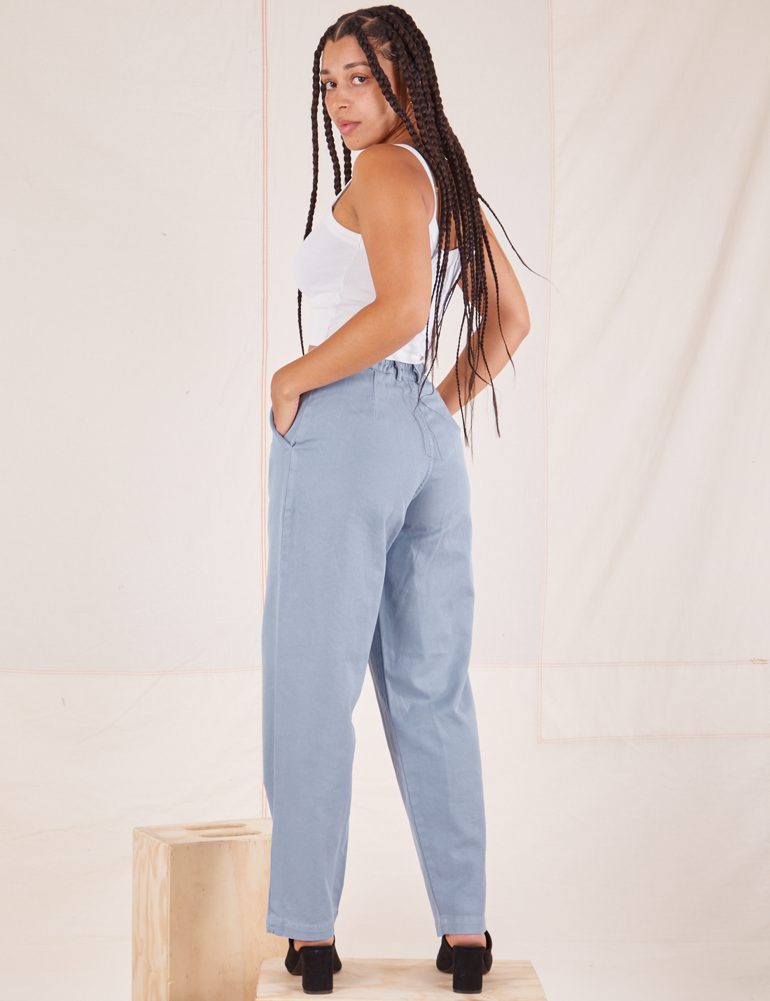 Back view of Organic Trousers in Periwinkle worn by Gabi