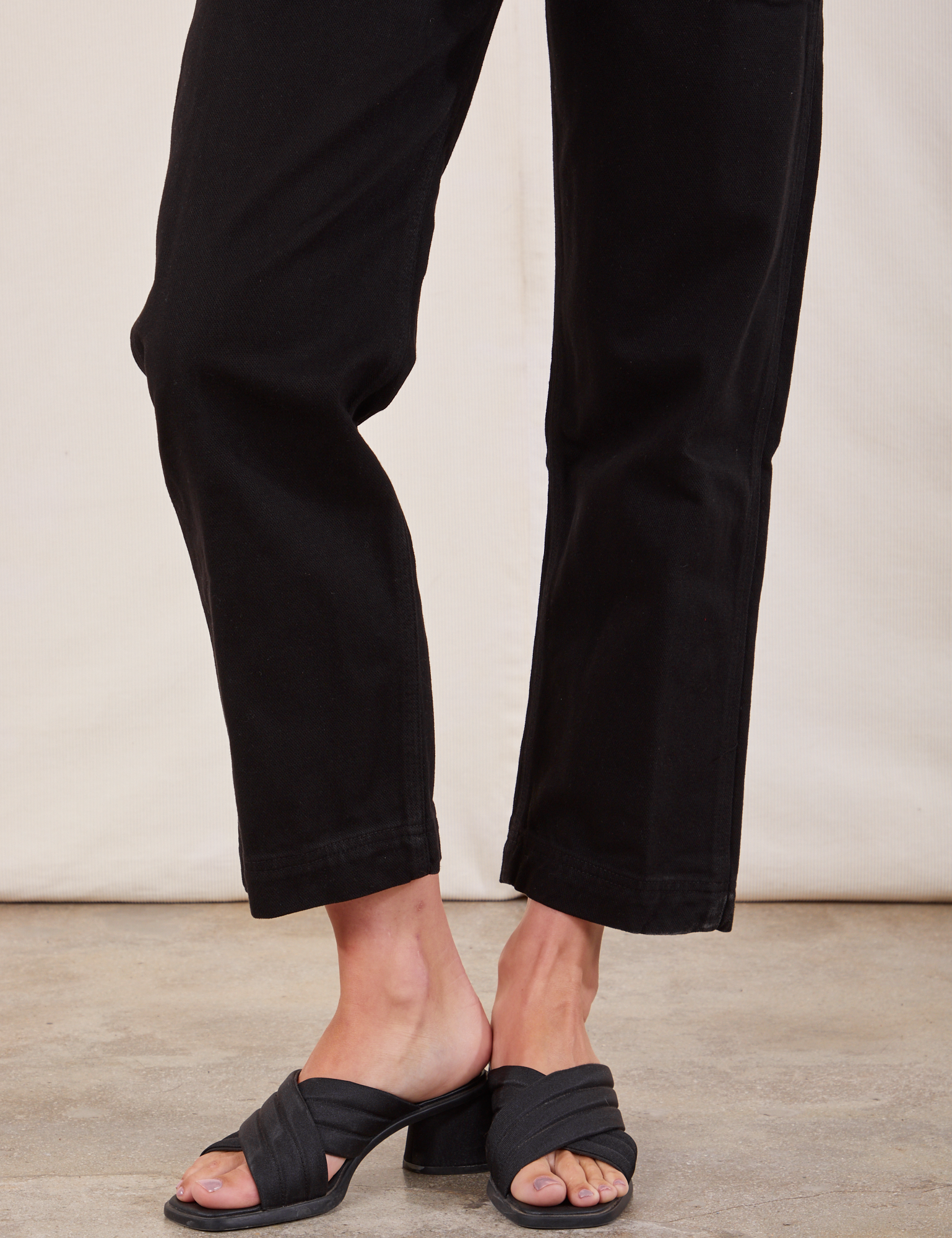 Original Overalls in Mono Black pant leg close up on Alex