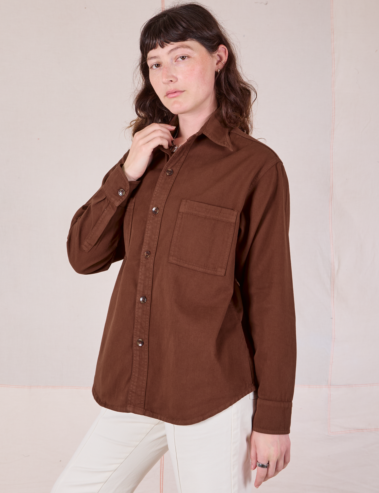 Angled front view of Twill Overshirt in Fudgesicle Brown on Alex