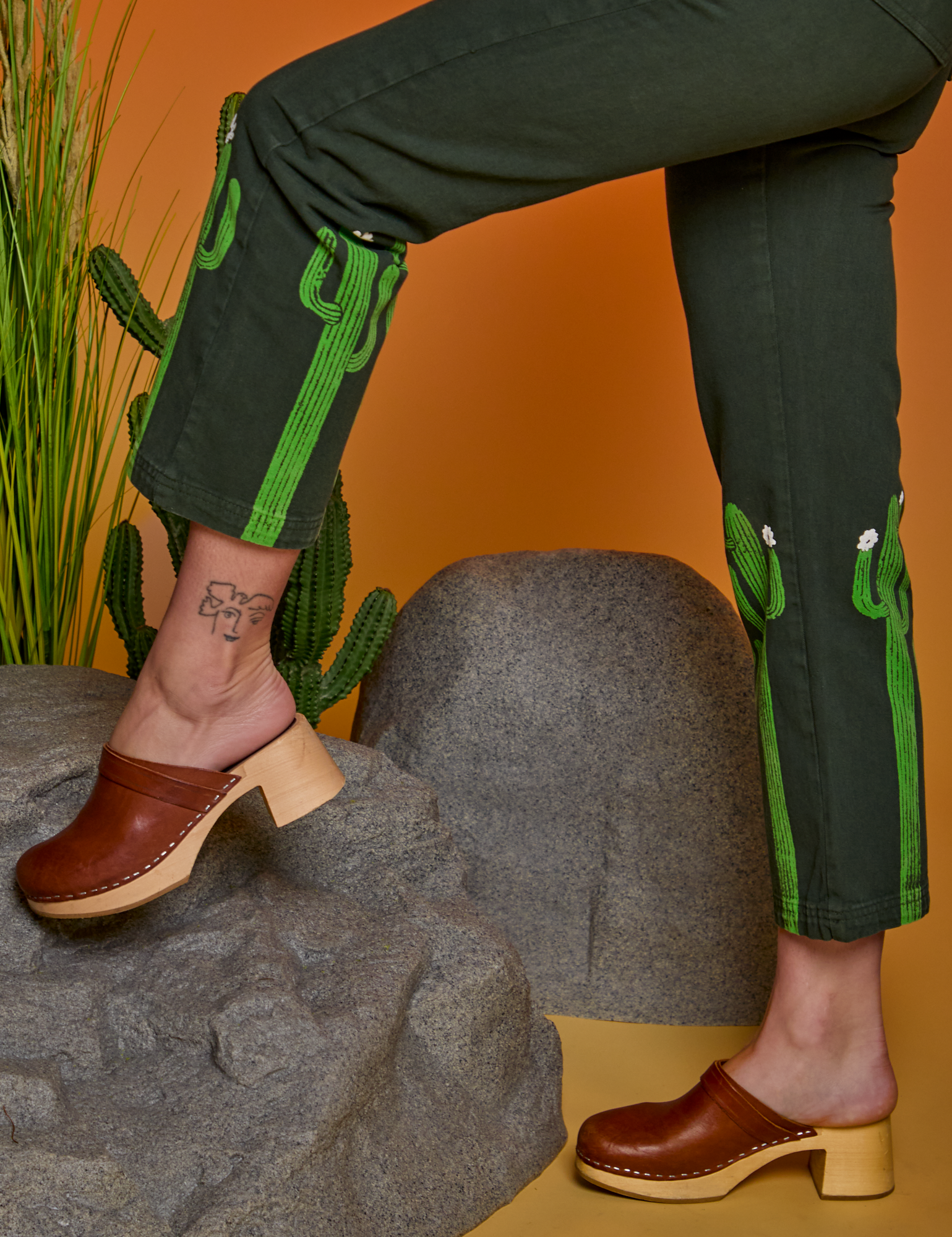 Paintstamped Work Pants in Cactus side pant leg close up on Alex