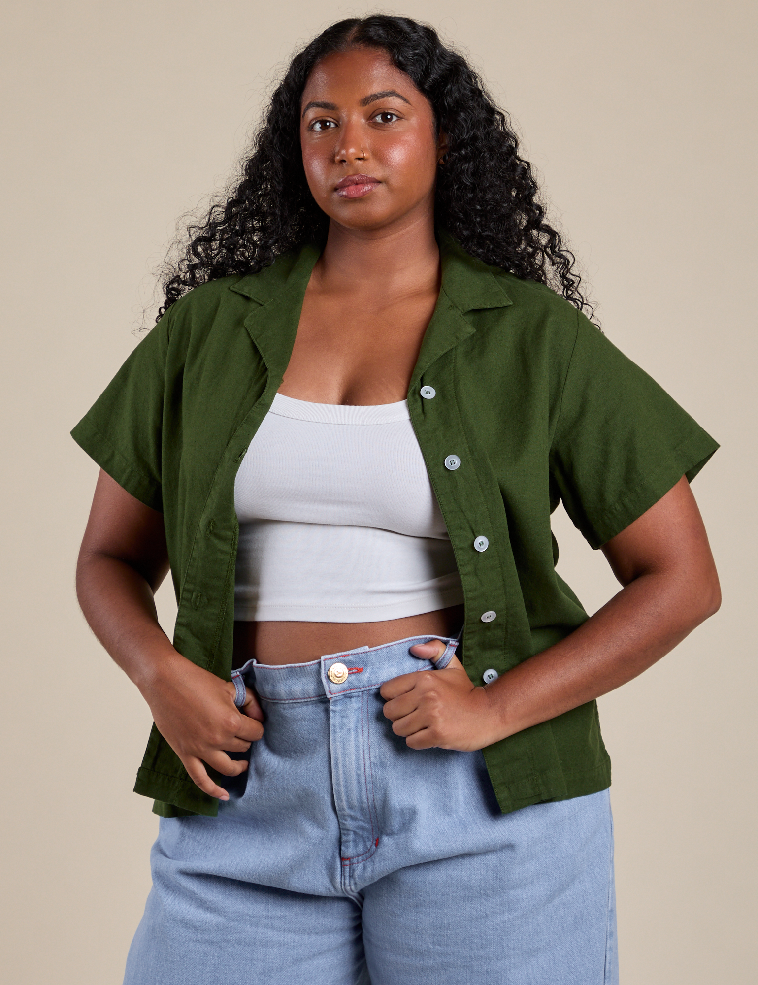 Meghna is 5’8” and wearing M Pantry Button-Up in Evergreen