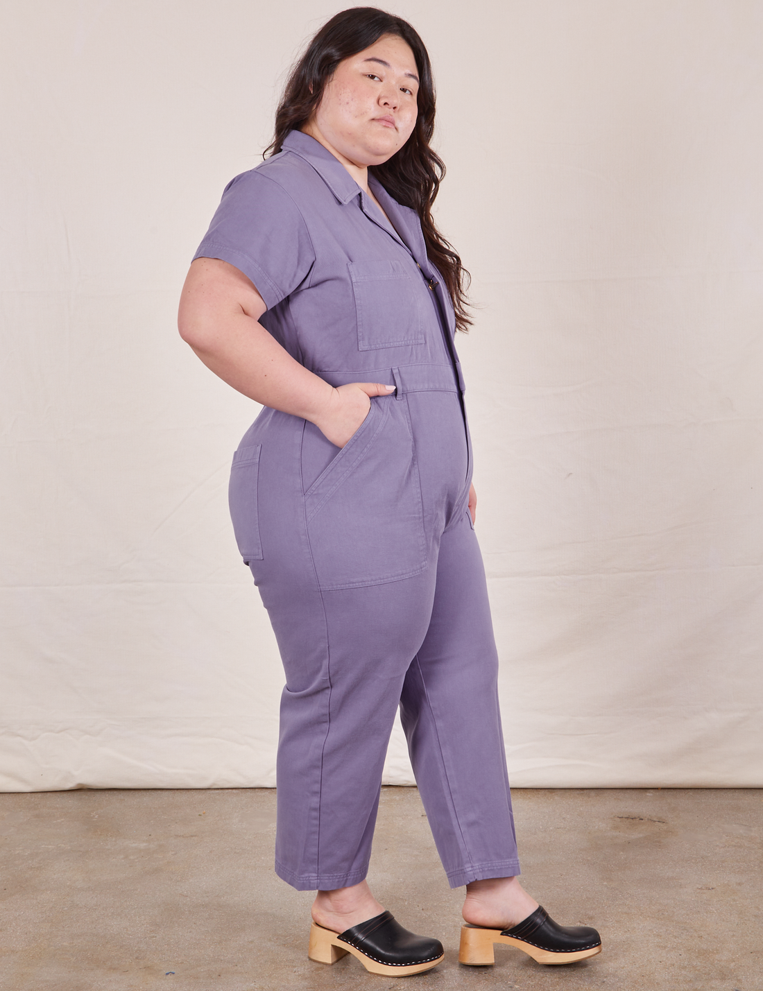 Petite Short Sleeve Jumpsuit in Faded Grape side view on Ashley