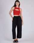 Alex in the Mustang Red Porthole Tank and Black Drop Pocket Cargo Pants