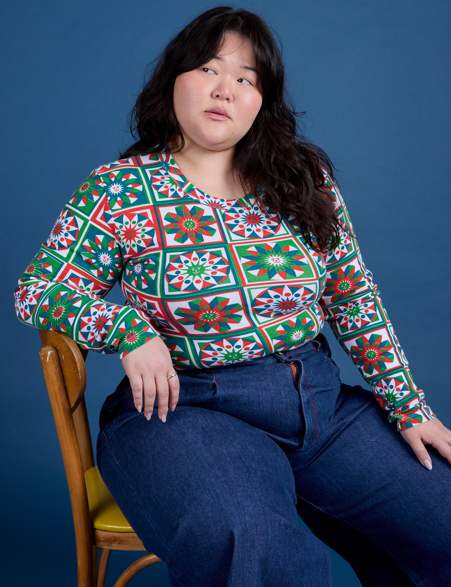 Ashley is wearing Long Sleeve Baby Tee in Quilt Print